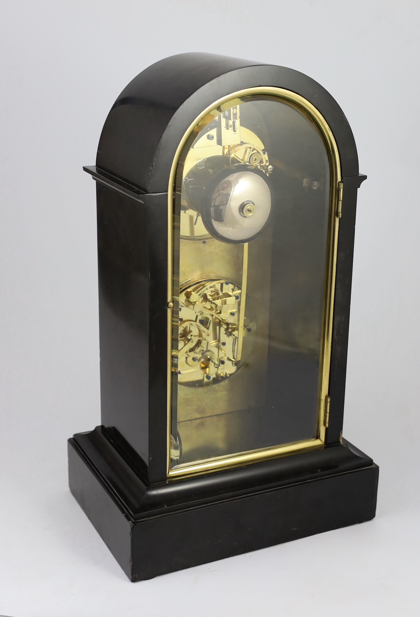 Henri Marc, Paris. A 19th century French arched top black marble mantel clock with perpetual calendar, width 28.5cm depth 20cm height 49cm